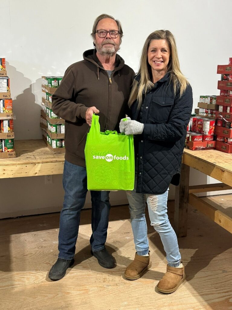 Rotarian Darryl O’Brian and Lead Packer Dianne Lambert